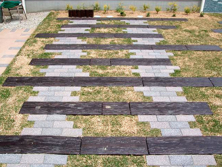 Why are wooden sleepers more suitable as garden sleepers?